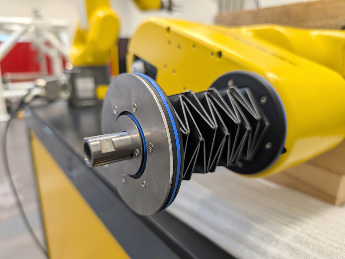 Montage Kit de protection Eclore sur un robot SCARA Fanuc 2026
